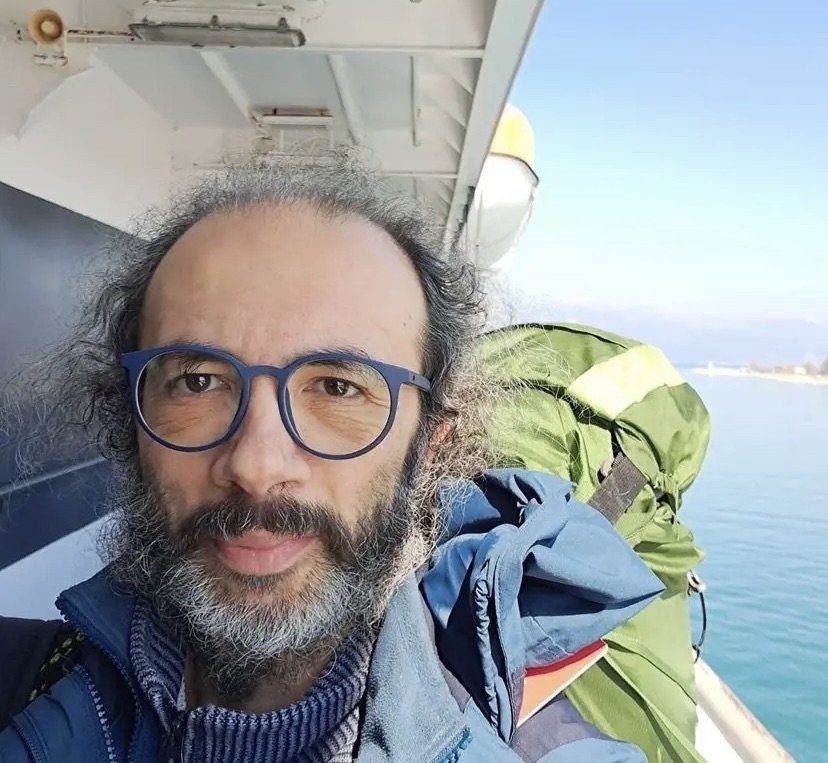 Gianluca Grimalda on the deck of a boat.